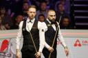 Hossein Vafaei, right, made his opinions clear after crashing out to Judd Trump at the Crucible (Richard Sellers/PA)