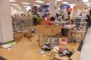A sad end: a customer's photo shows bargain hunters stripping the shelves bare