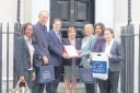 Trina Golland and Grant Shapps and HOST members with the petition.