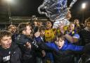 St Albans City's Shaun Jeffers celebrates with fans on the pitch after the Emirates FA Cup first round match at Clarence Park. Credit: PA