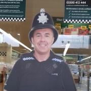 The 'police officer' on duty at a local supermarket.