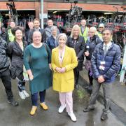 Daisy Cooper MP (centre, yellow jacket) opens St Albans' cycle hub flanked by Station Manager Harsitt Chandak (right) and ward councillor Jacqui Taylor and other Thameslink and community representatives. Credit: Andy Buckley