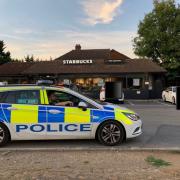 Police outside Starbucks on the A405 in Chiswell Green. Credit: St Albans Police