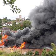 The building on fire on the industrial estate off London Road in St Albans. Credit: Adrian Gladwin
