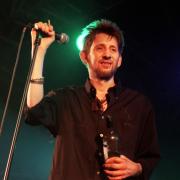 The late Shane MacGowan performing with The Pogues. Image: PA