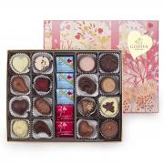 Godiva, Mother’s Day gift box with 21 chocolates and lid design featuring original artwork by French artist Charlotte Gastaut, £30, godivachocolates.co.uk