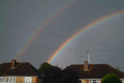 June Houlston, of Longacres, St Albans, took this photo. She said: I was coming downstairs on Wednesday evening when I noticed there was a double rainbow outside.  I don't know what causes this but it was a beautiful sight. 