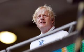 Boris Johnson watching the semi final between England and Denmark. Picture: PA