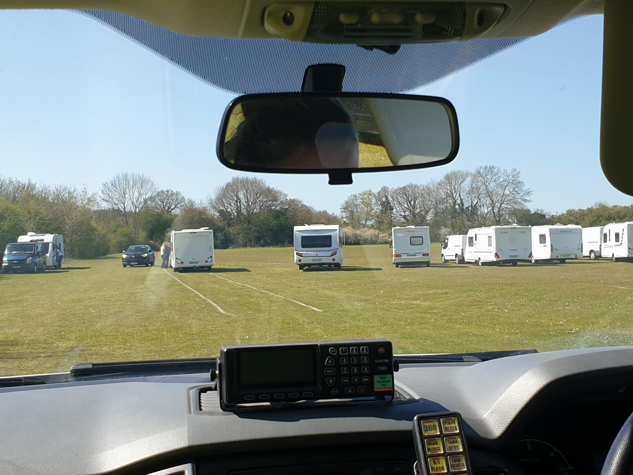 Caravans parked on playing fields in Wheathampstead. Credit: St Albans Police