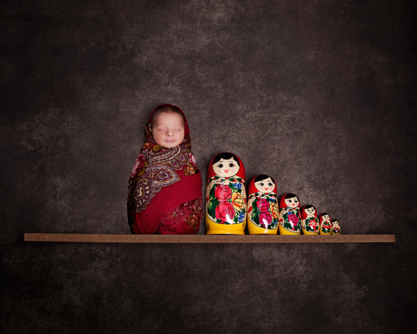 A Russian doll inspired photograph of a newborn. Credit: Peekaboo Studios
