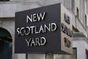 New Scotland Yard sign outside the headquarters of the Metropolitan Police. Credit: PA