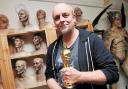 Mark, with his Academy Award, at his St Albans studio - Coulier Creatures FX. (Pictured by Holly Cant)
