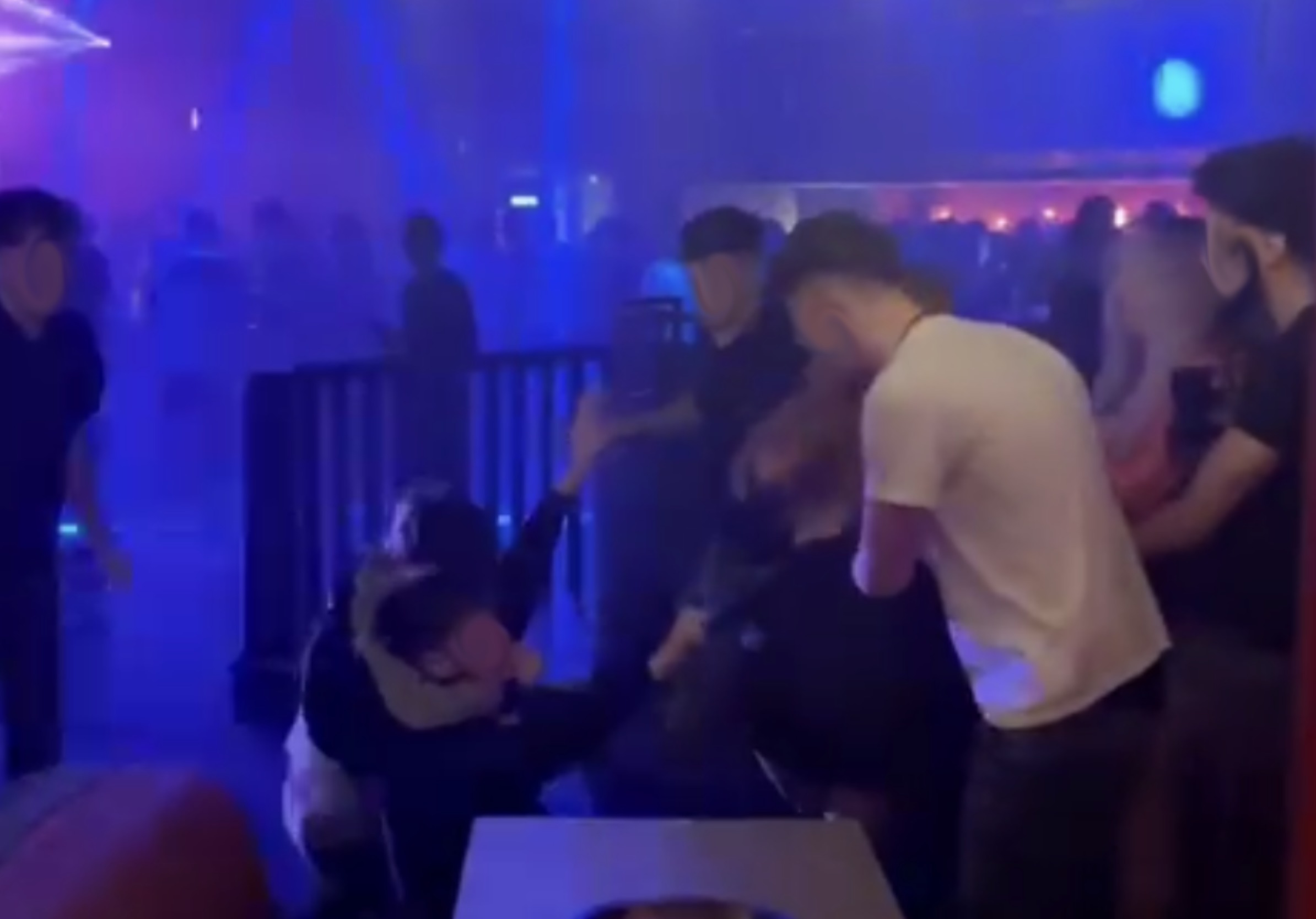 Screengrabs of footage in the club, as a victim was dragged to the floor