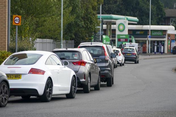 UK fuel industry tell UK drivers when queues at petrol stations will end. (PA)