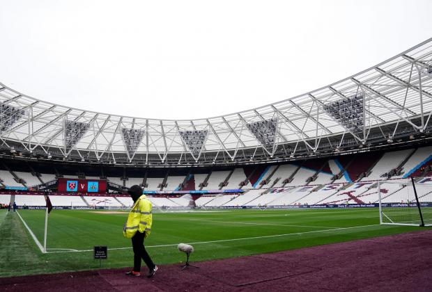 St Albans & Harpenden Review: A general view of a steward by the pitch before the Premier League match at the London Stadium, London