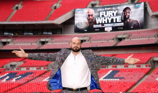 St Albans & Harpenden Review: Tyson Fury poses on the pitch after the press conference at Wembley Stadium, London (PA)