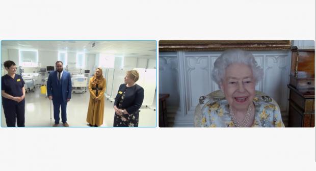 St Albans & Harpenden Review: Queen Elizabeth II speaking to Dr Marie Healey, Divisional Director for Surgery and Critical Care; Mr Asef and Mrs Shamina Hussain; and Jackie Sullivan during a video link call (PA)
