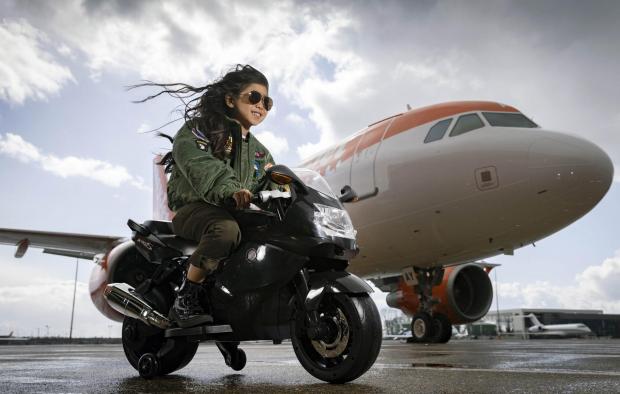 St Albans & Harpenden Review: Rei Diec, aged 7 during filming of a parody of the movie Top Gun at Luton airport as part of easyJet's nextGen recruitment campaign. Credit: PA/easyJet