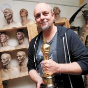 Mark, with his Academy Award, at his St Albans studio - Coulier Creatures FX. (Pictured by Holly Cant)
